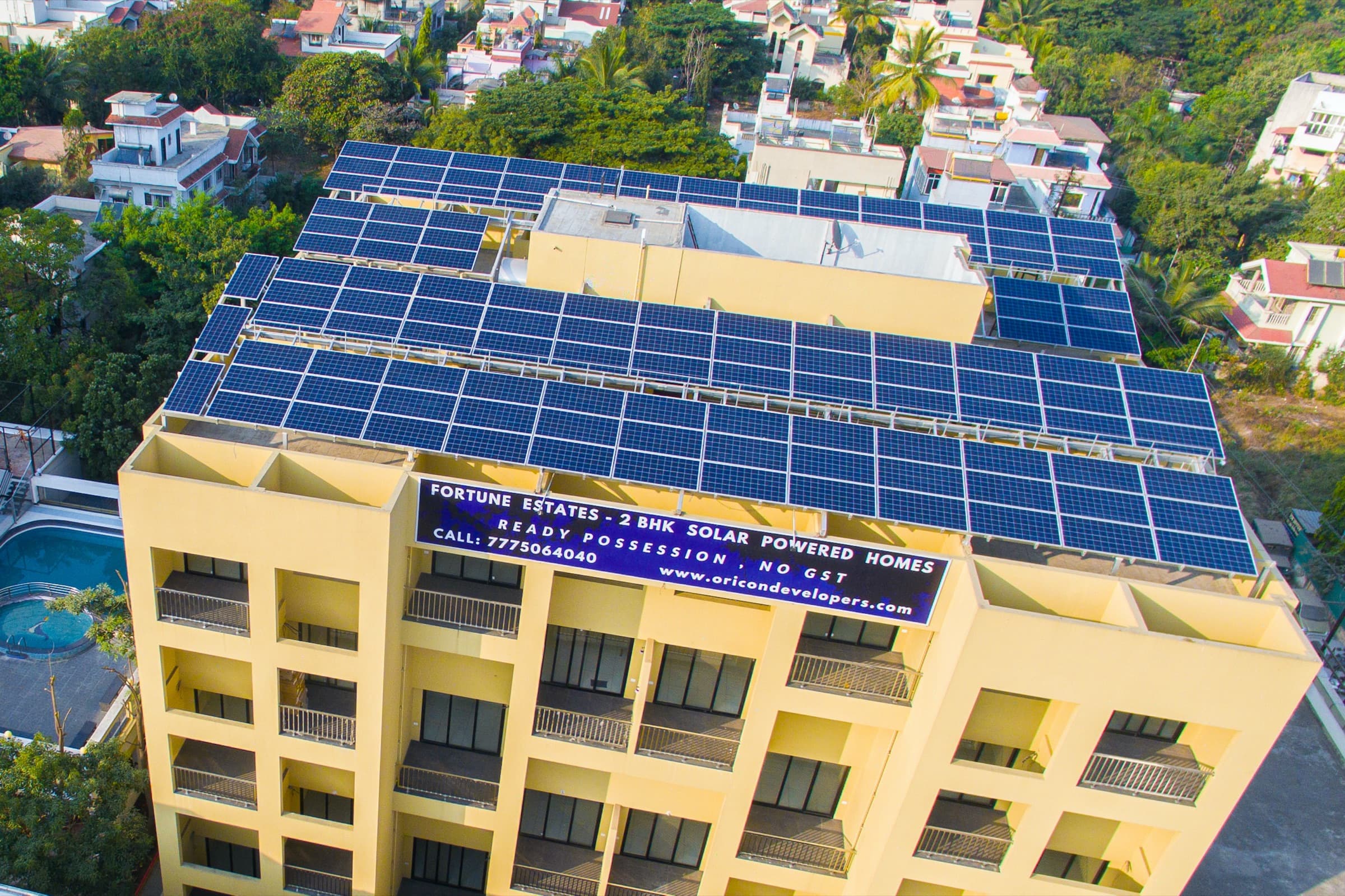 Rooftop solar installation at Scorpio, Fortune Estates in Pune, distributing power to all 24 flats